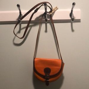 Orange statement purse